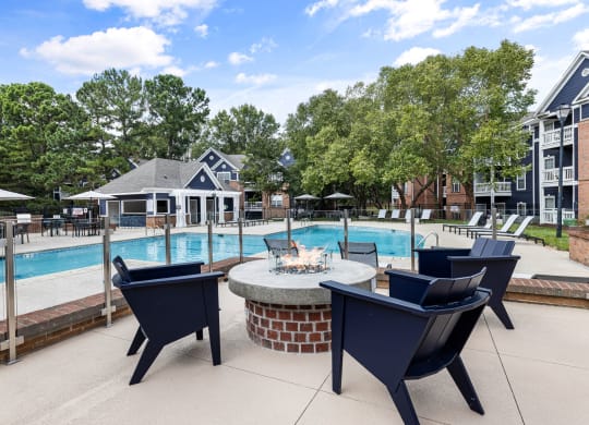 the preserve at ballantyne commons pool and patio with chairs and fire pit at Mariners Crossing, North Carolina, 27612
