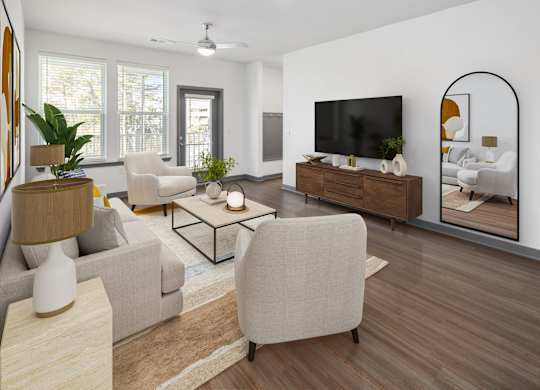 A modern living room with a large television and a mirror on the wall.