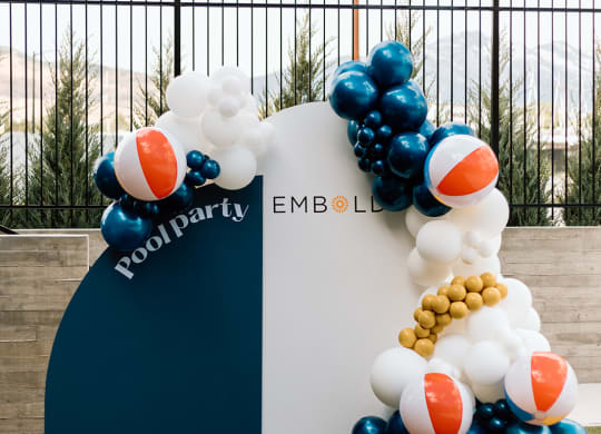 a blue and white balloon arch with a nautical theme  at Embold, Lehi, Utah