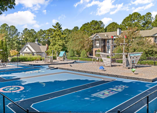 basketball court at the preserve at green trees apartments at View at Lake Lynn, North Carolina