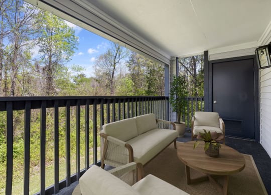 Balcony with couch at The Madison at Adams Farm, North Carolina