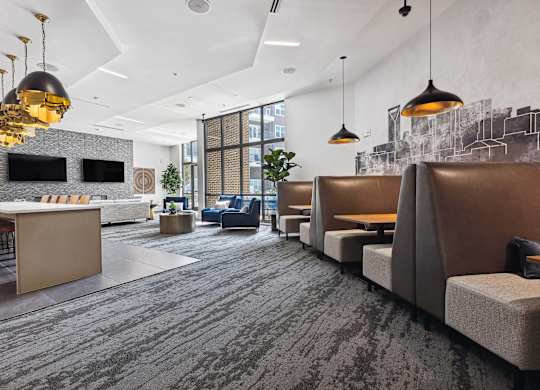 a large room with couches and chairs