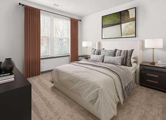 A bedroom with a large bed and a painting on the wall.
