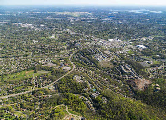 Gallery slide 40 of 42 - a aerial view of a neighborhood with houses and trees