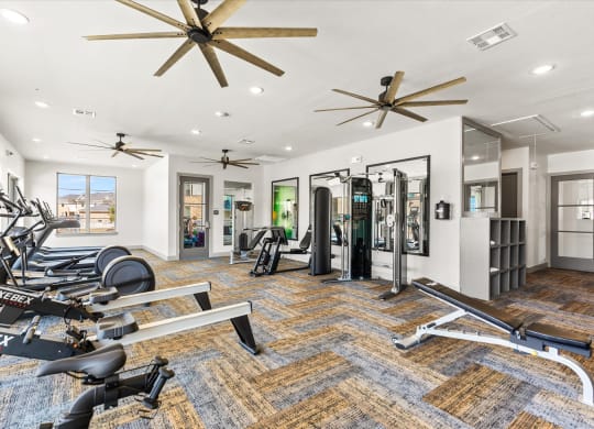 fitness center with enclosed yoga room