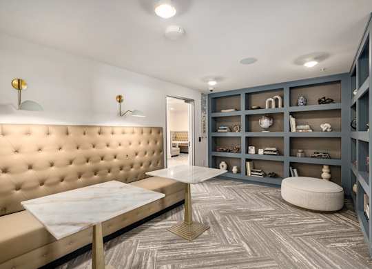 a living room with a couch and a table
