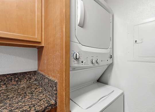 An in-unit stackable washer and dryer.