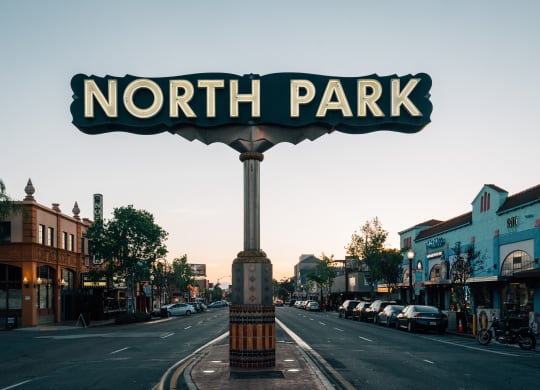 a sign for north park on a city street