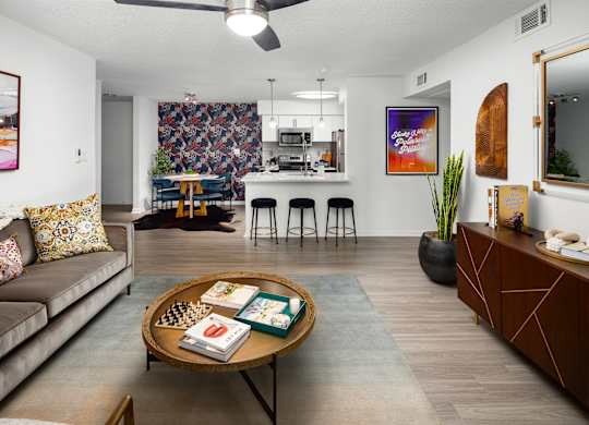 a living room with a couch and a table