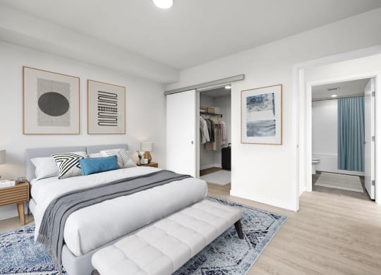 a bedroom with a bed and a mirror at Ion Town Center, Shoreline, WA 98133
