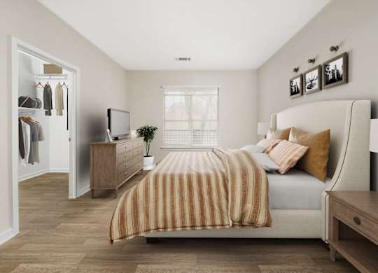 a bedroom with a bed and a dresser