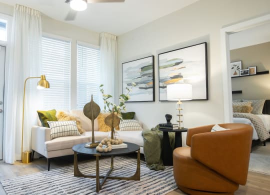 a living room with a couch and a table