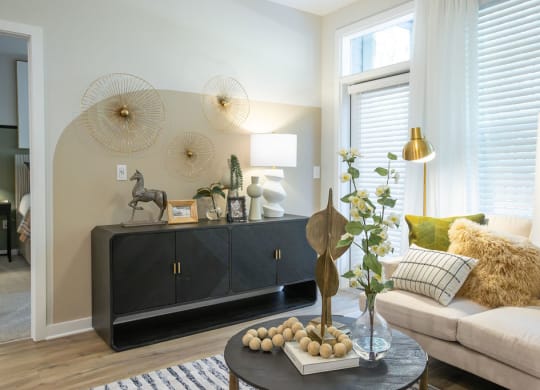 a living room with a couch and a table