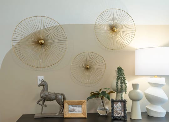 a living room with various objects on a table