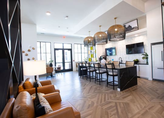 a living room with a kitchen and a dining room