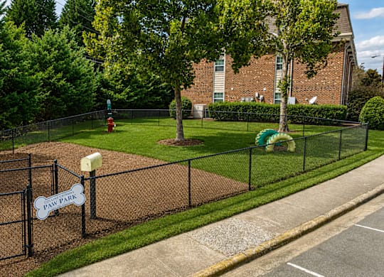 A playground with a sign that says "PLAY PARK".