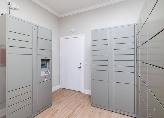a room with two gray lockers and a white door at Clear Creek Meadows Apartments, Copperas Cove, Texas