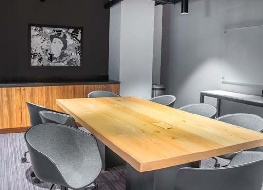 A conference room with a long table and chairs.at Axle, Seattle, WA 98119 