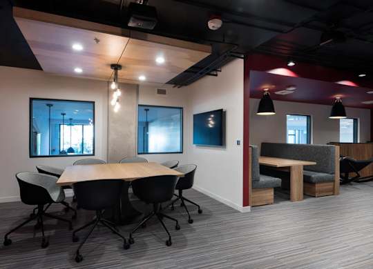 A conference room with a long table and chairs.at Axle, Seattle, 98119 