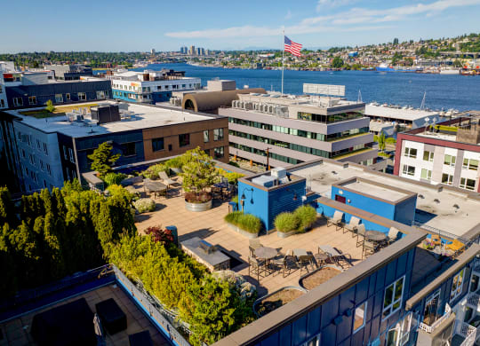 a view from above of a building with a flag on top and a body of water in  at Dexter Lake Union, Seattle