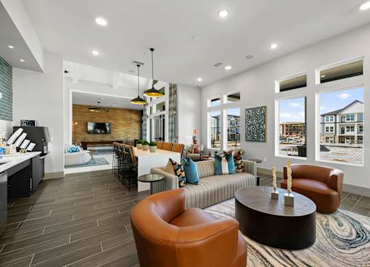 A modern living room with a brown leather chair and a wooden coffee table.