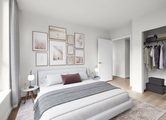 a bedroom with a bed and a dresser in a room at Ion Town Center, Washington, 98133