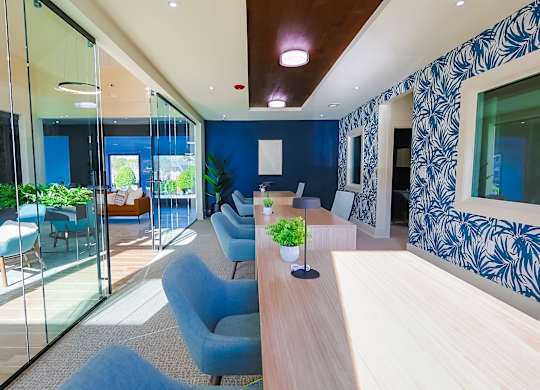Office area with blue chair at The Madison at Adams Farm, Greensboro, 27407