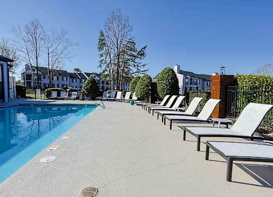 Pool with sun loungers at The Madison at Adams Farm, Greensboro, NC, 27407