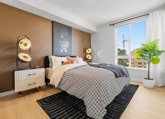 a bedroom with a bed and a window at Ion Town Center, Shoreline, WA 98133