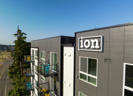 a picture of the lion building with a blue sky in the background at Ion Town Center, Washington, 98133