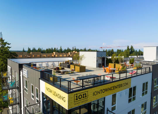 a view from the top of a building of a construction site with a crane in the background at Ion Town Center, Washington