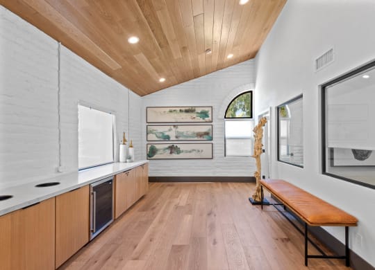 Resident Café lounge with wood floors and white walls