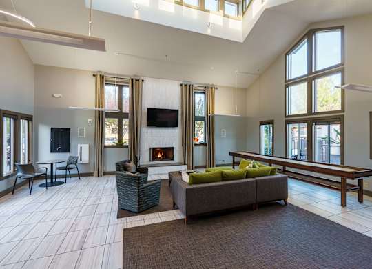 A living room with a fireplace and a couch.