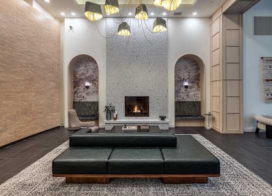 a living room with a fireplace and a couch