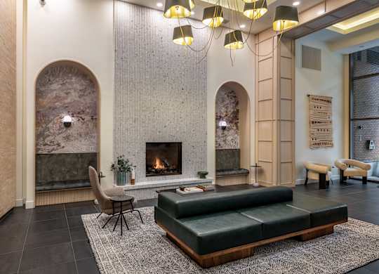 a living room with a fireplace and a couch