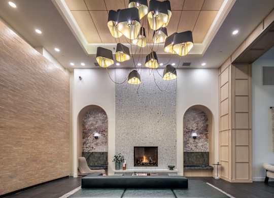 a living room with a fireplace and a couch