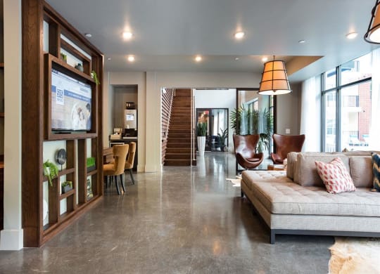 a living room with a couch and a television