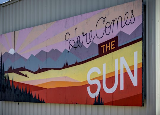 A mural on a building wall says