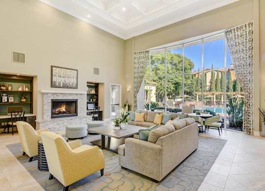 Clubhouse with a fireplace and a couch.