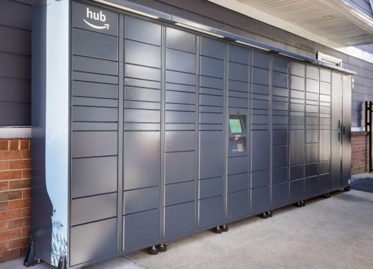 a large metal door with a sign that says hub on top of it at Mariners Crossing, Raleigh, 27613