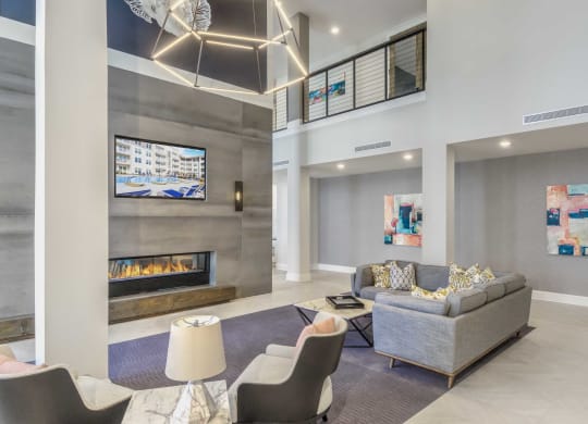 a living room with a couch and a fireplace