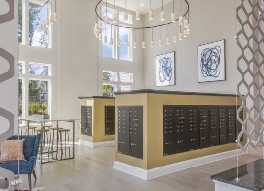 the lobby or reception area of a hotel with a large calendar on the wall