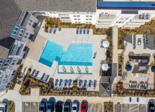an aerial view of the pool at the resort