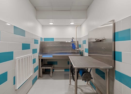 a kitchen with a sink and a table