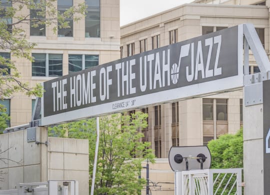 a sign for the home of the city of jazz in front of a building