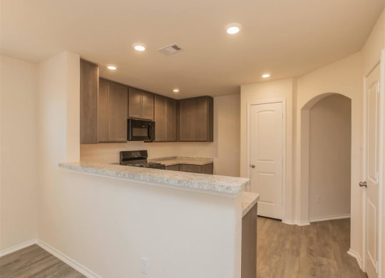 a kitchen or kitchenette at chic hollywood home central to everything at The Village at Granger Pines, Conroe, TX 77302