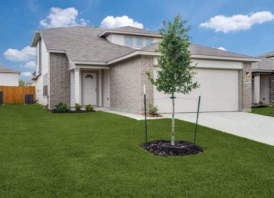 Front Yard With Green Space at The Village at Caney Mills, Conroe