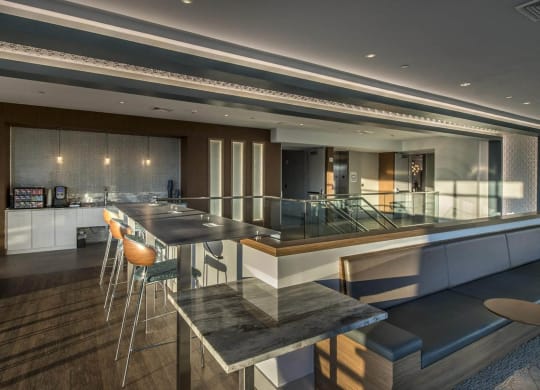 a kitchen and bar in a hotel room