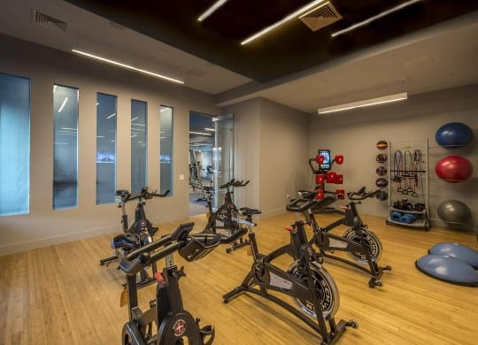a gym with bikes and other exercise equipment