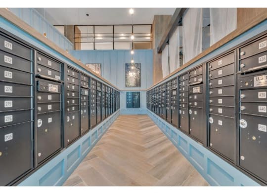 the lockers are lined up in a long room with wood floors